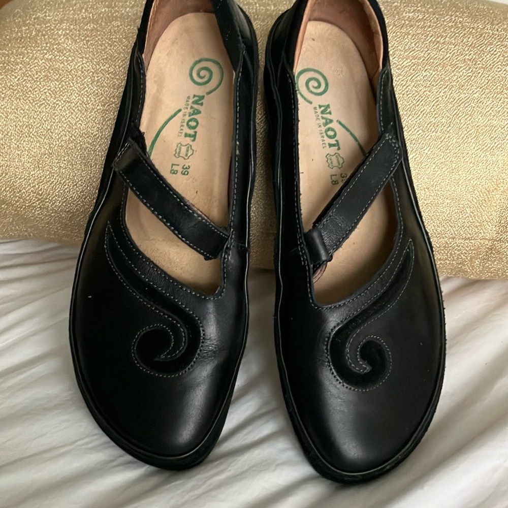 Naot Black Flats with Unique Curled Design and Comfortable Sole